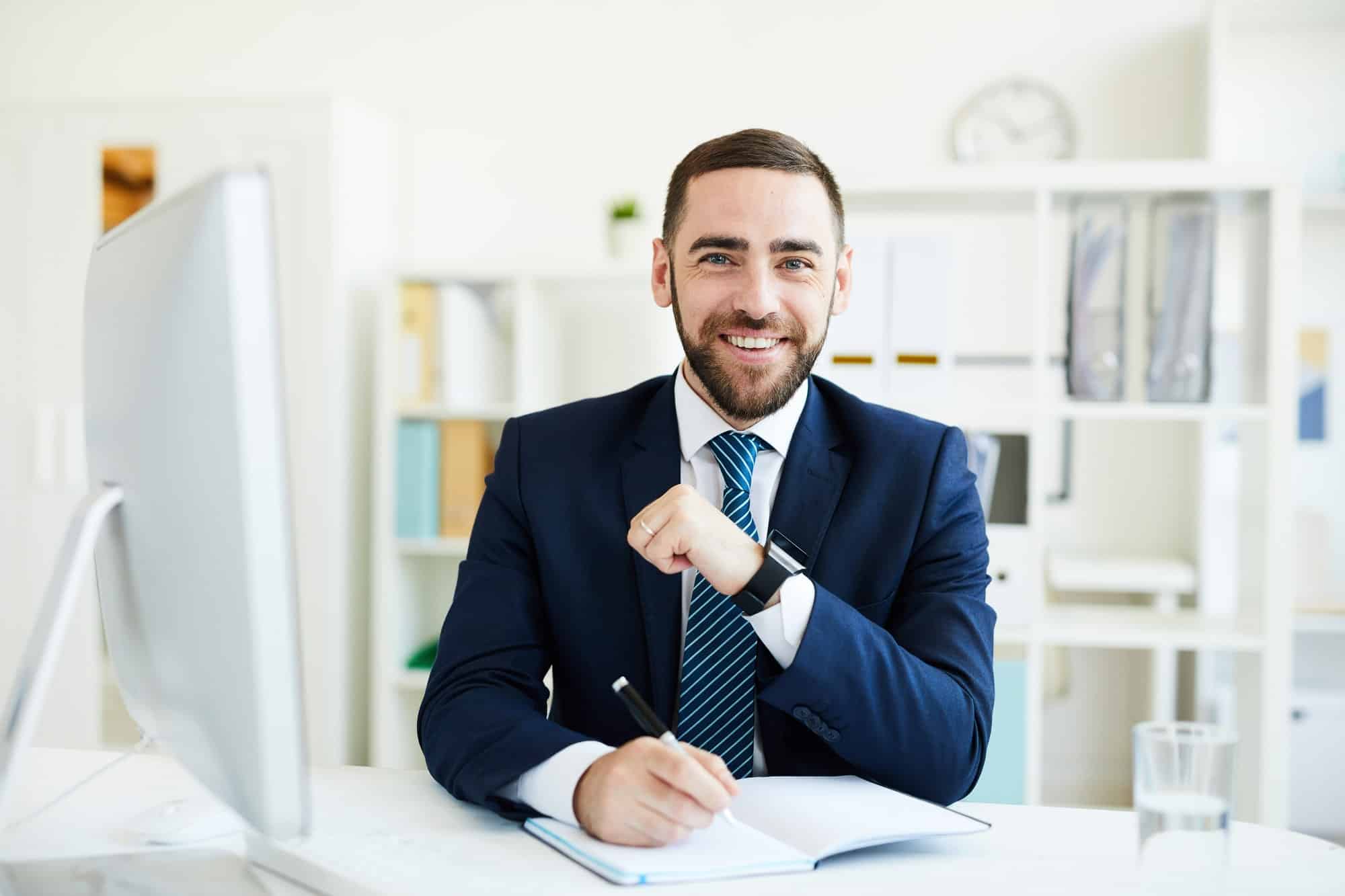 Happy CEO at desk